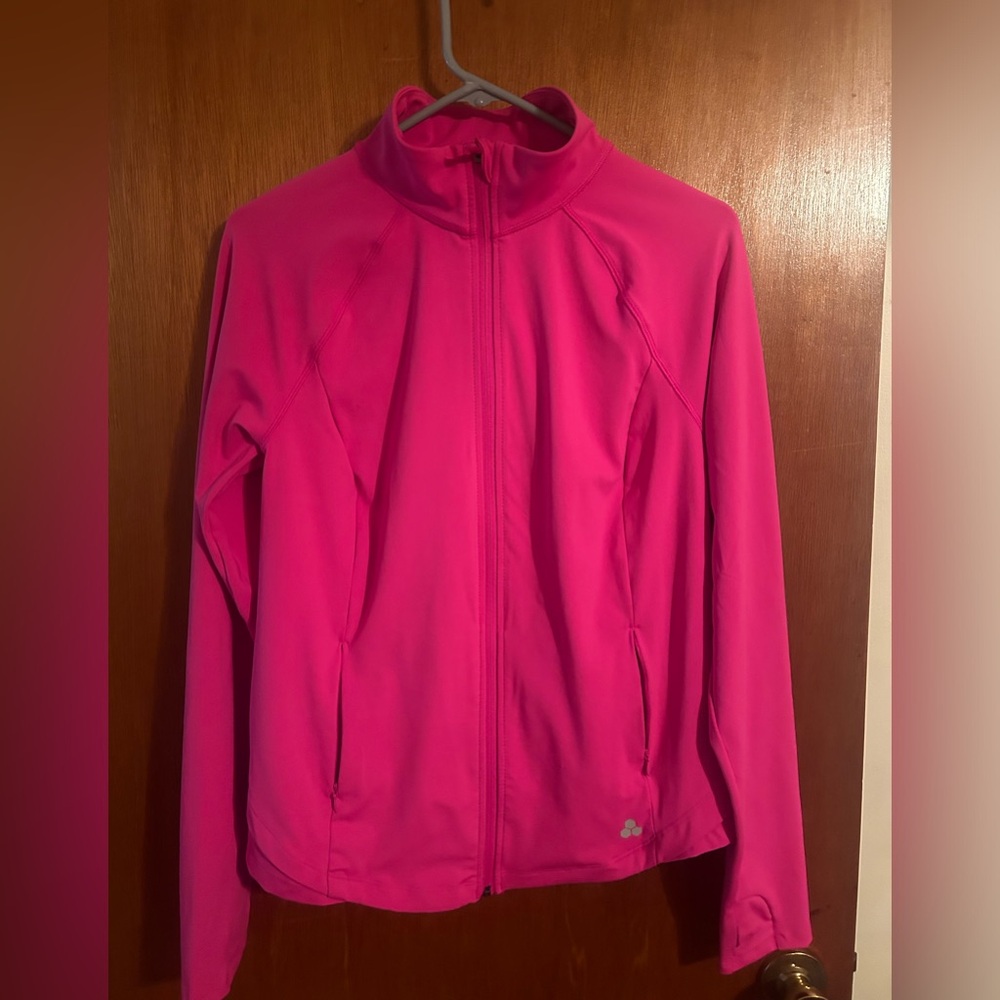 Zip up work out top, discos. Size large, 2 zip up pockets.